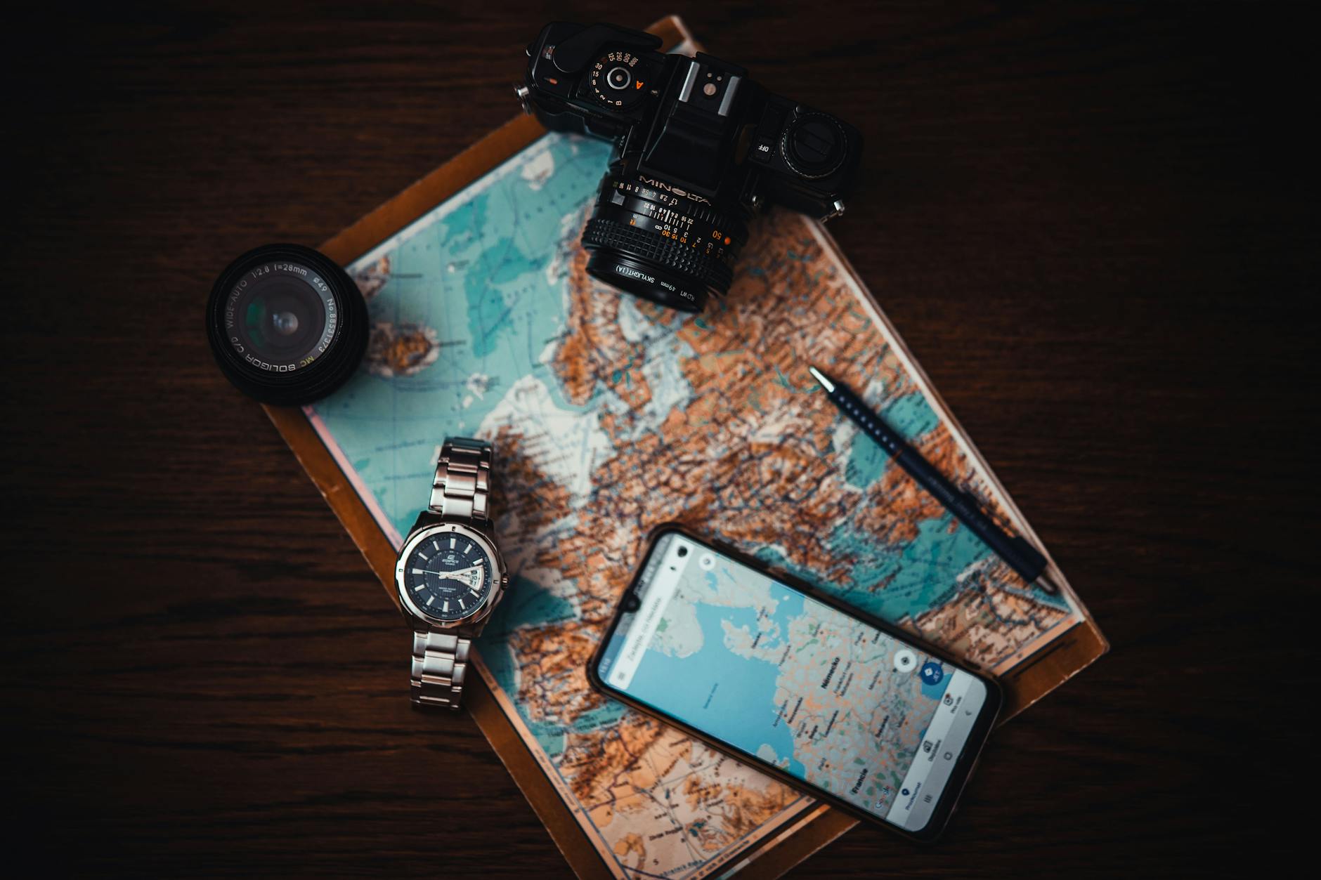 https://www.pexels.com/photo/smartphone-beside-watch-and-camera-3243090/